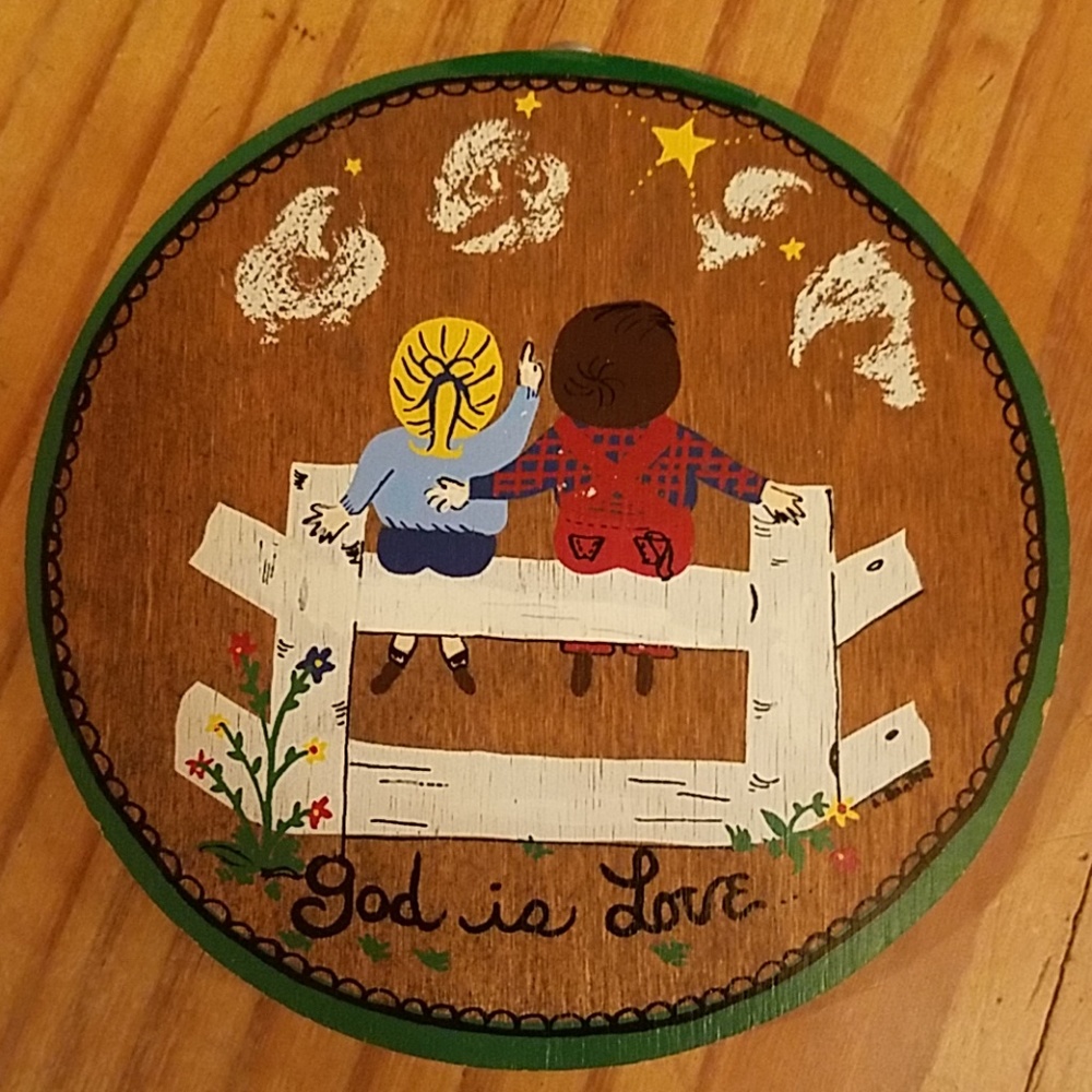 Handpainted "God is love" sign. Approx. 5 inches